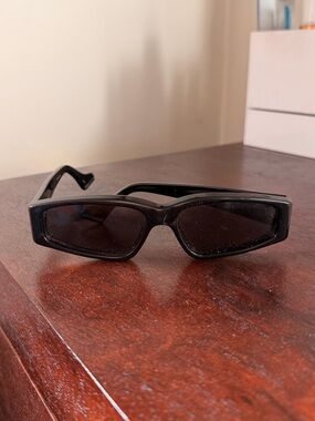 Gucci Sleek Black Rectangular unisex Sunglasses
